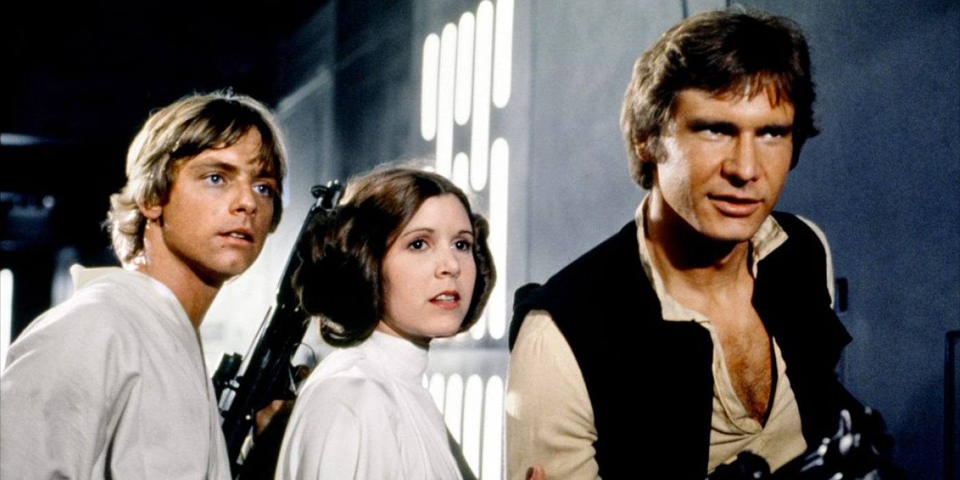 Luke, Han and Leia fight off Stormtroopers in Star Wars.