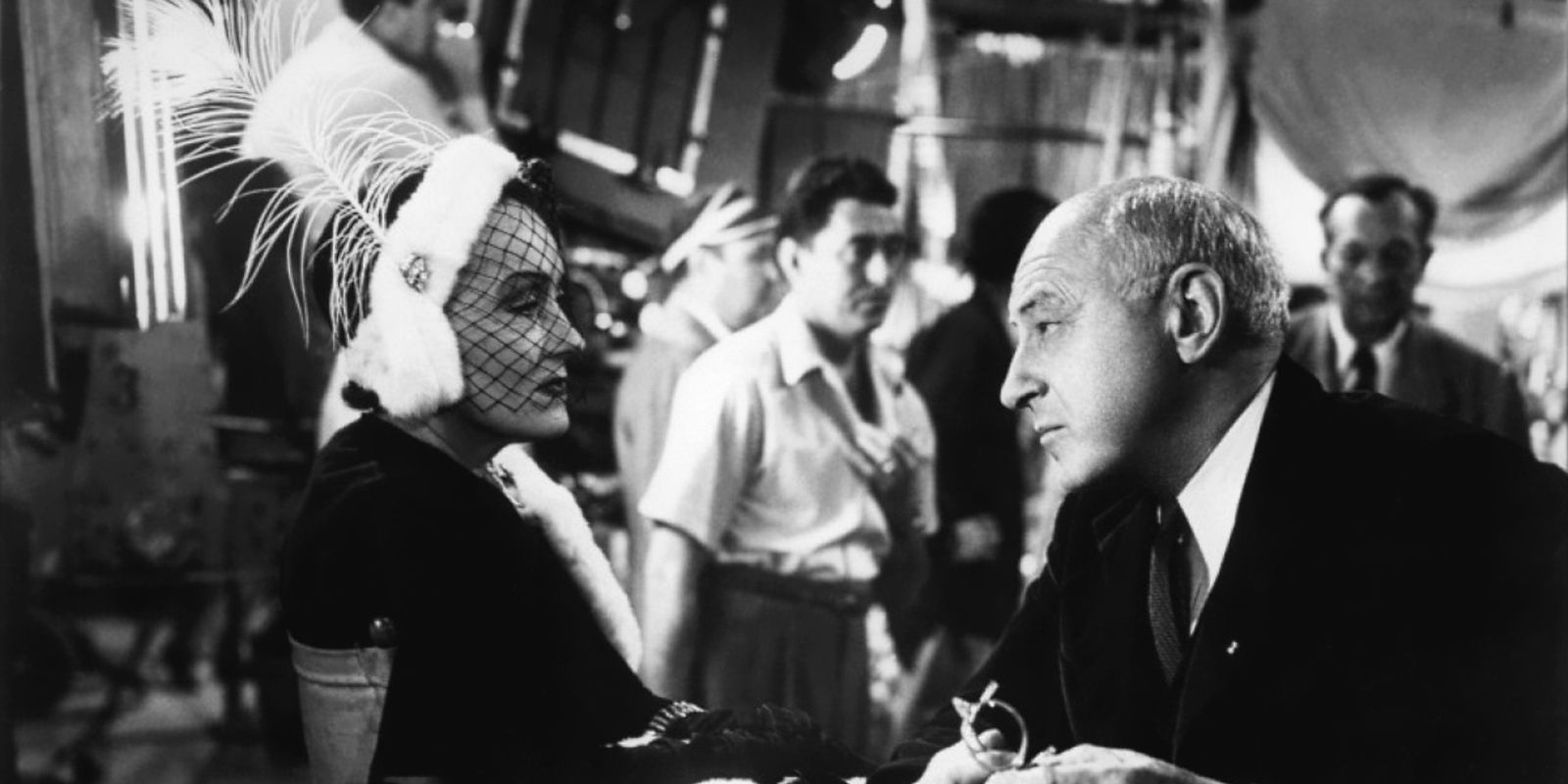 Norma and DeMille have a warm conversation on set in Sunset Boulevard