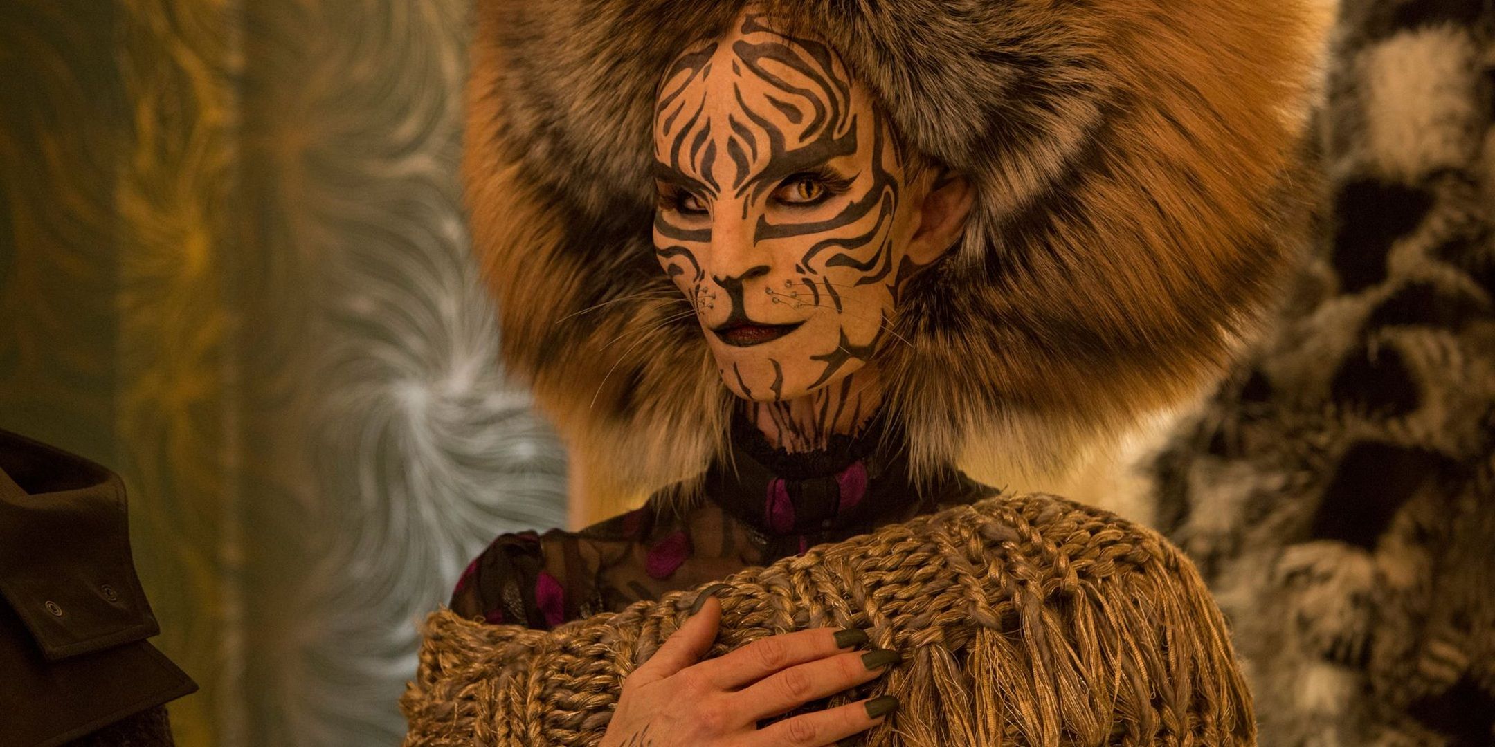 Tigris enters a room in all of her finery