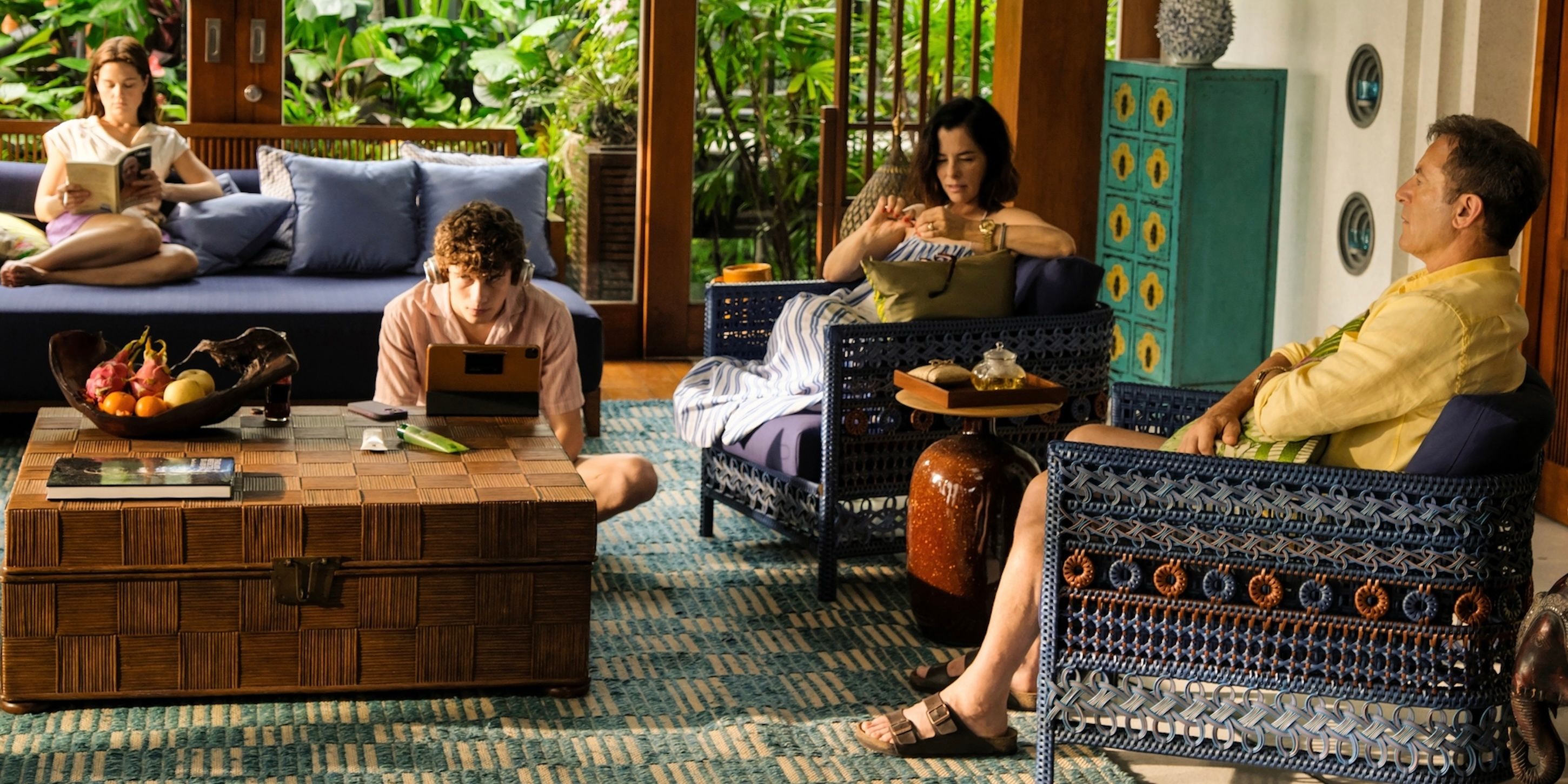 Piper, Lochlan, Victoria and Tim on the white lotus sitting outside their room.