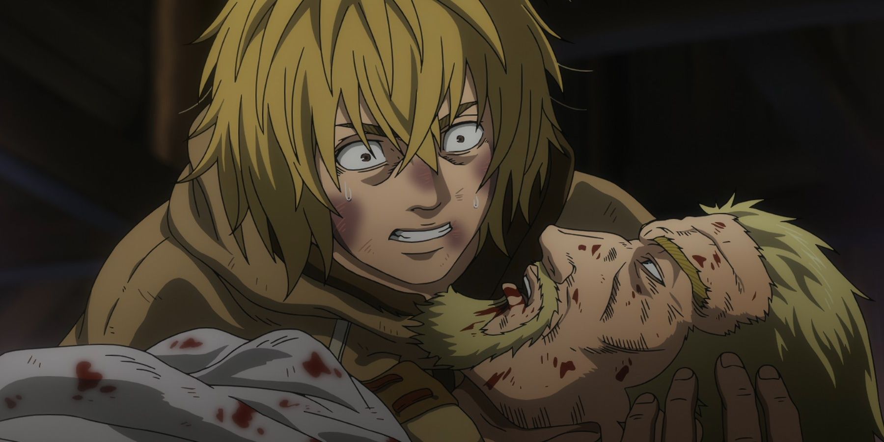 Thorfinn panics while holding a dying, bloody Askeladd.