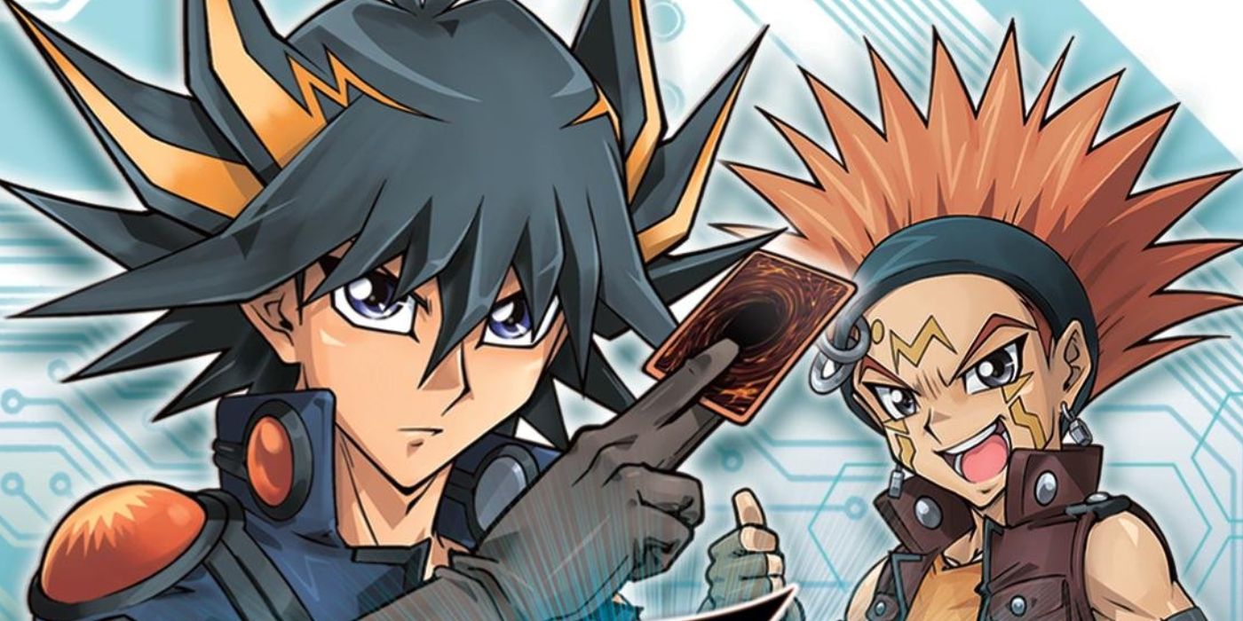 ¡Yusei Fudo sostiene una tarjeta junto a Crow Hogan en la cubierta de CUT de Yu-Gi-oh! Fuerza de la etiqueta 5.