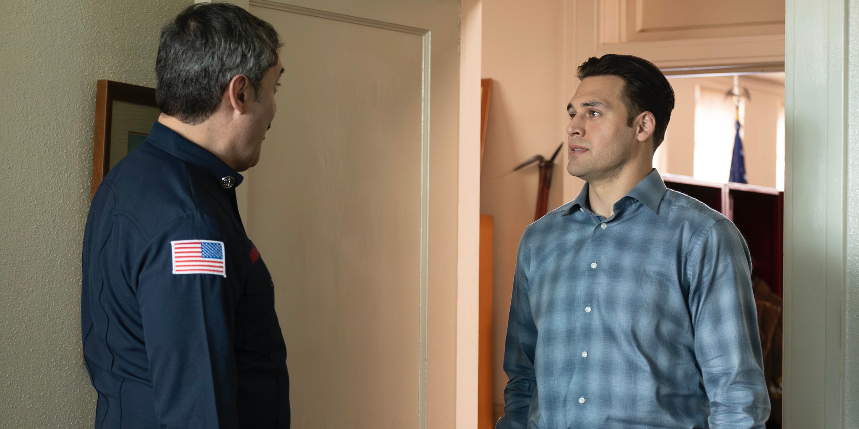 Eddie Diaz (Ryan Guzman) talking to a fire captain (Eric Neil Gutierrez) on 9-1-1