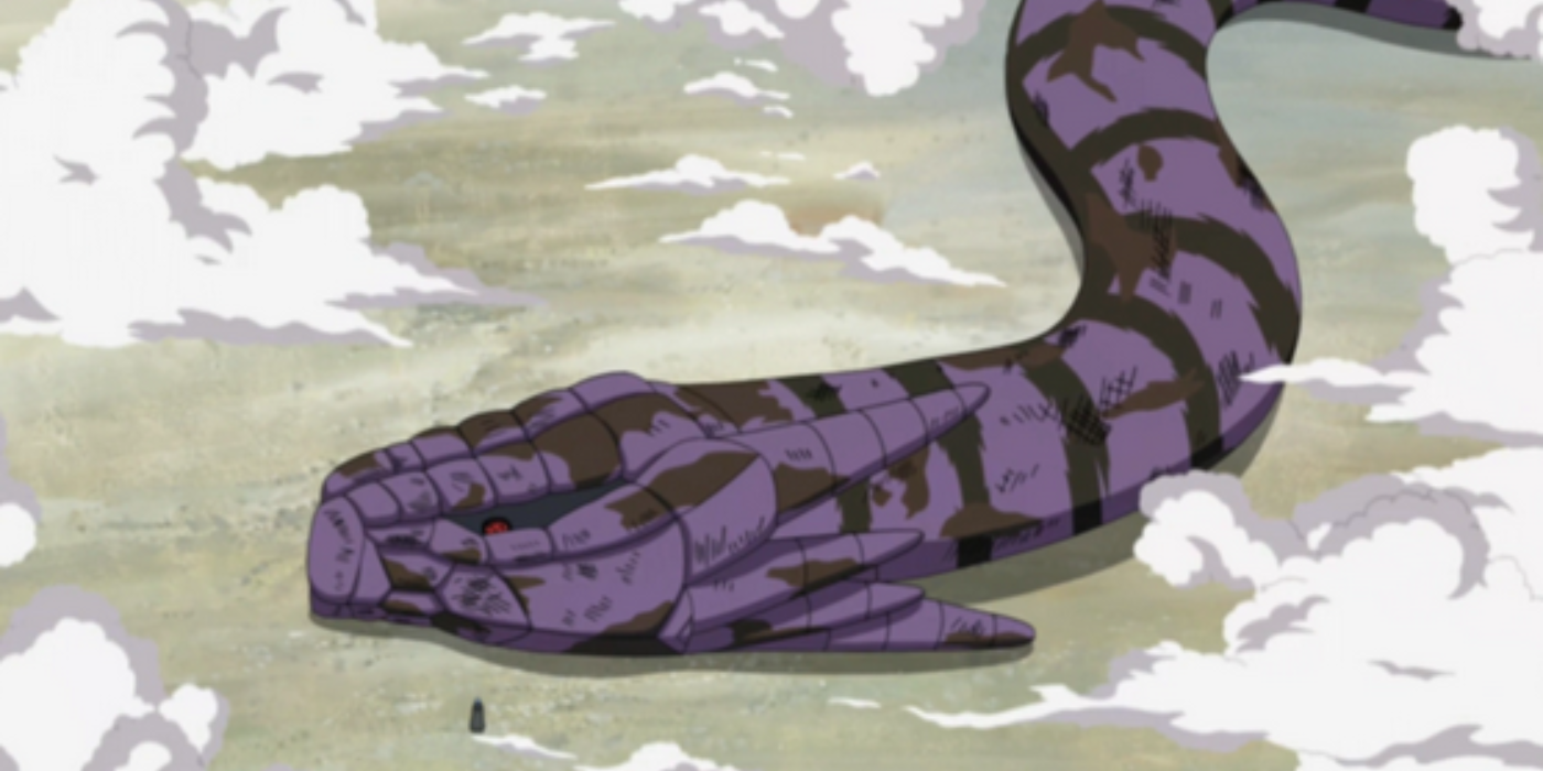 A dead Manda lies on the ground in Naruto: Shippuden.