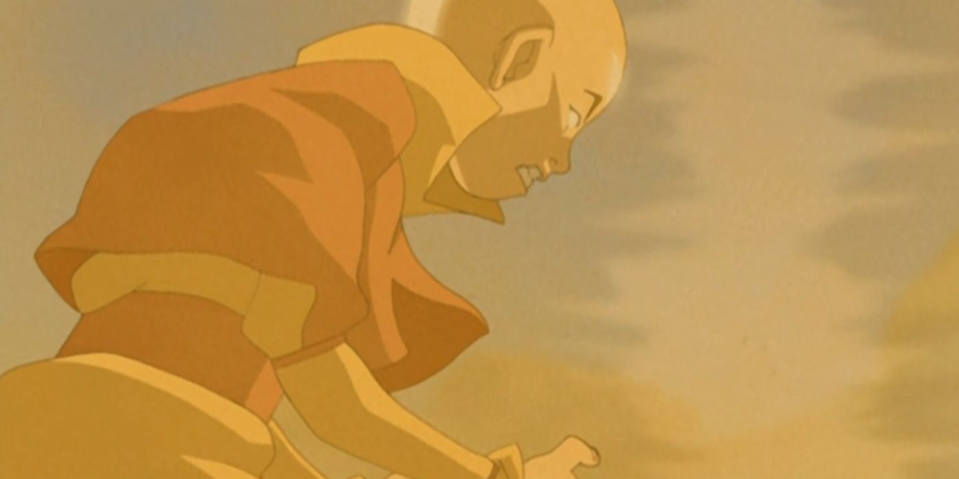 Aang, etrafında kumla avatar devletine girer.