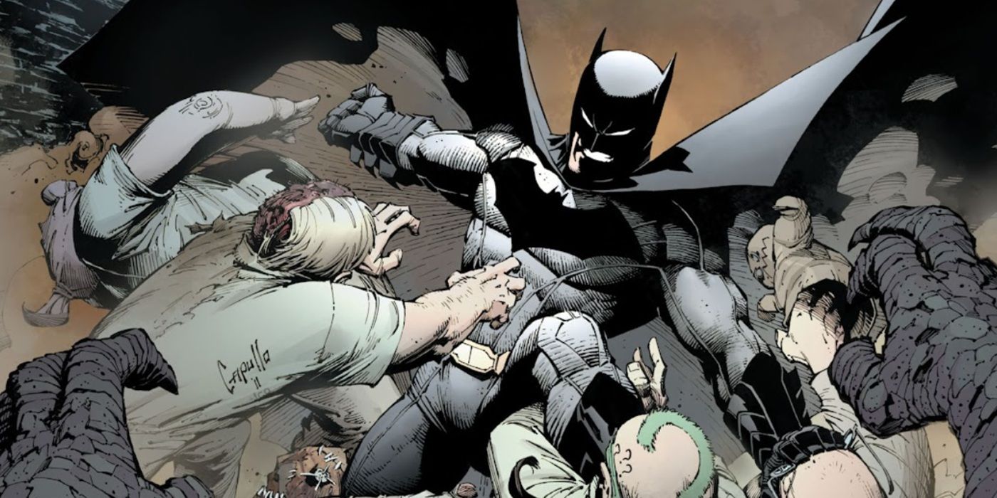 Batman Volume 2 #1 Cover where Batman fights off a bunch of crooks.