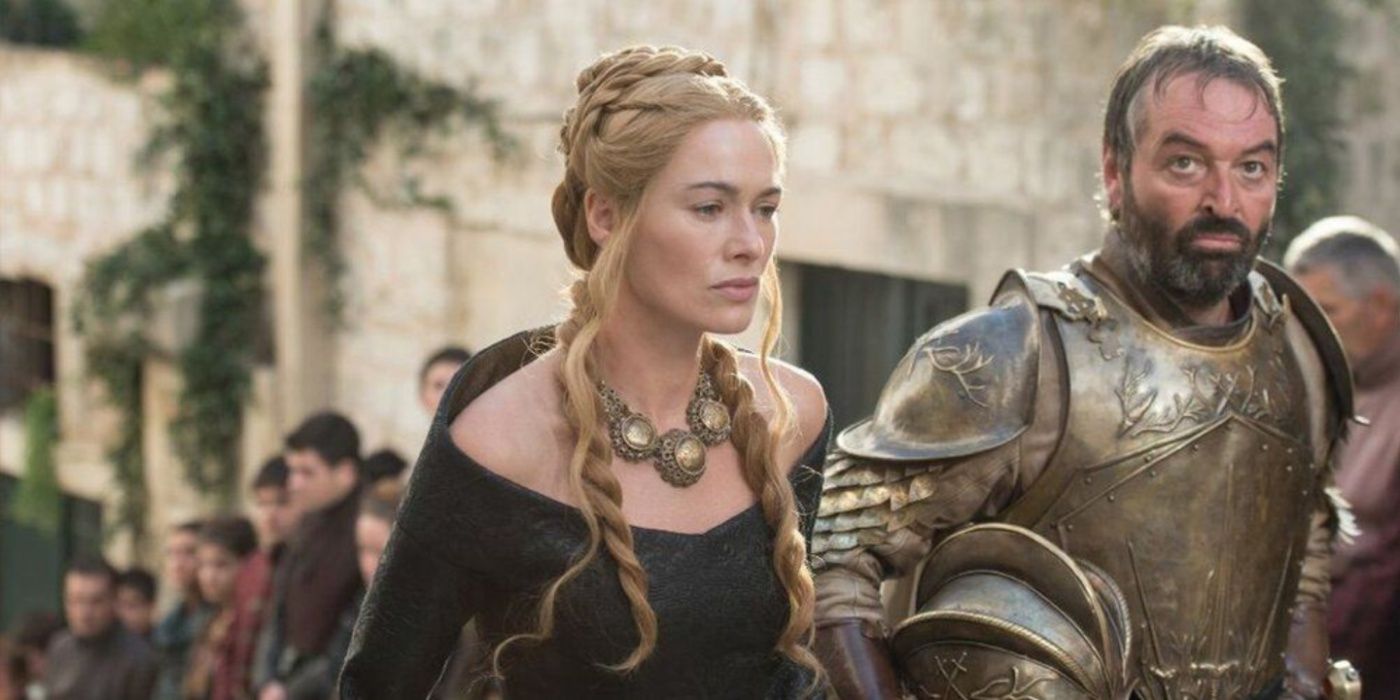 Cersei Lannister walks King's Landing with Meryn Trant in Season 5 of Game of Thrones.