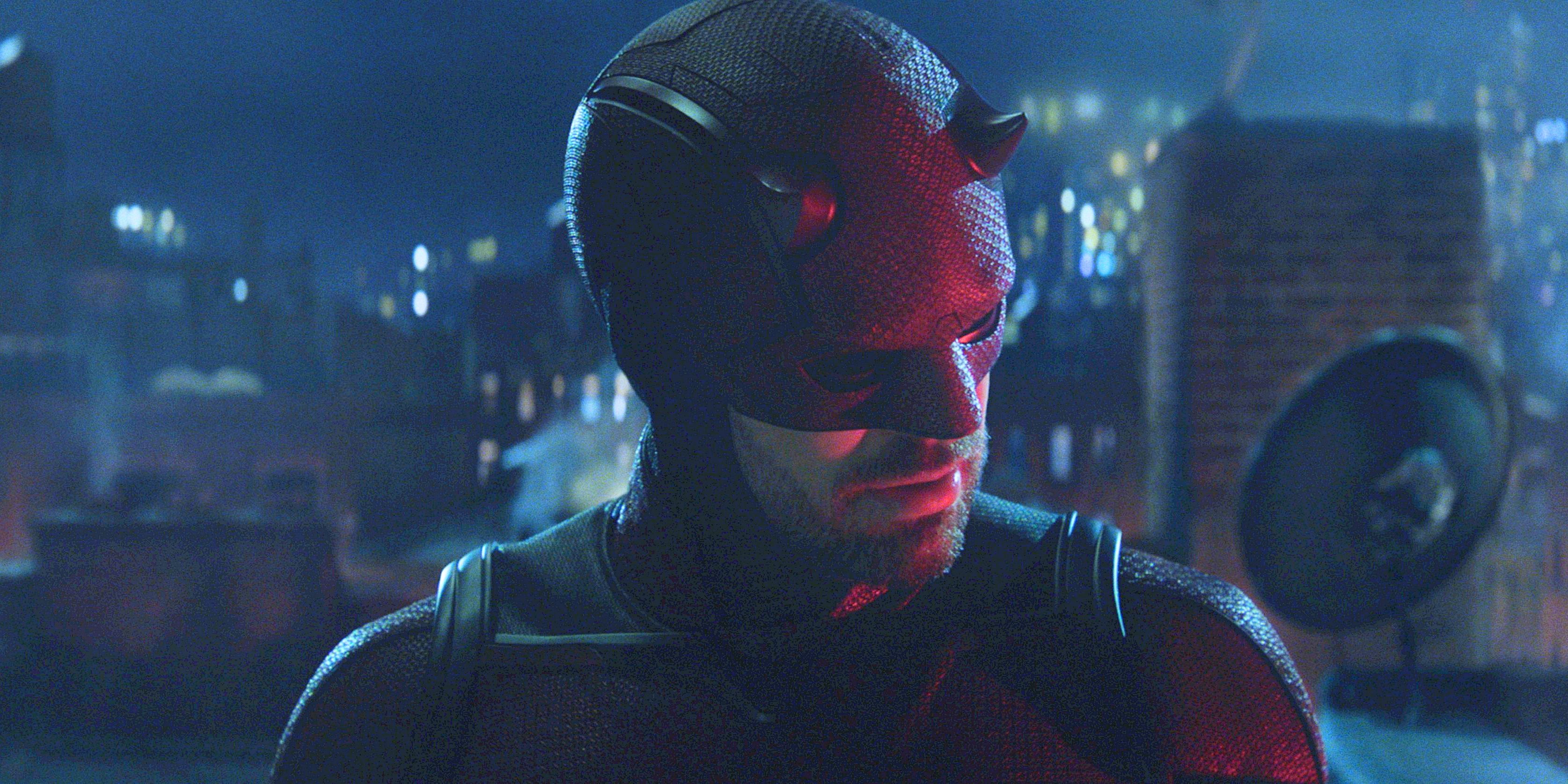 Daredevil on a dark rooftop head tilted and turned over his left shoulder from Daredevil Born Again