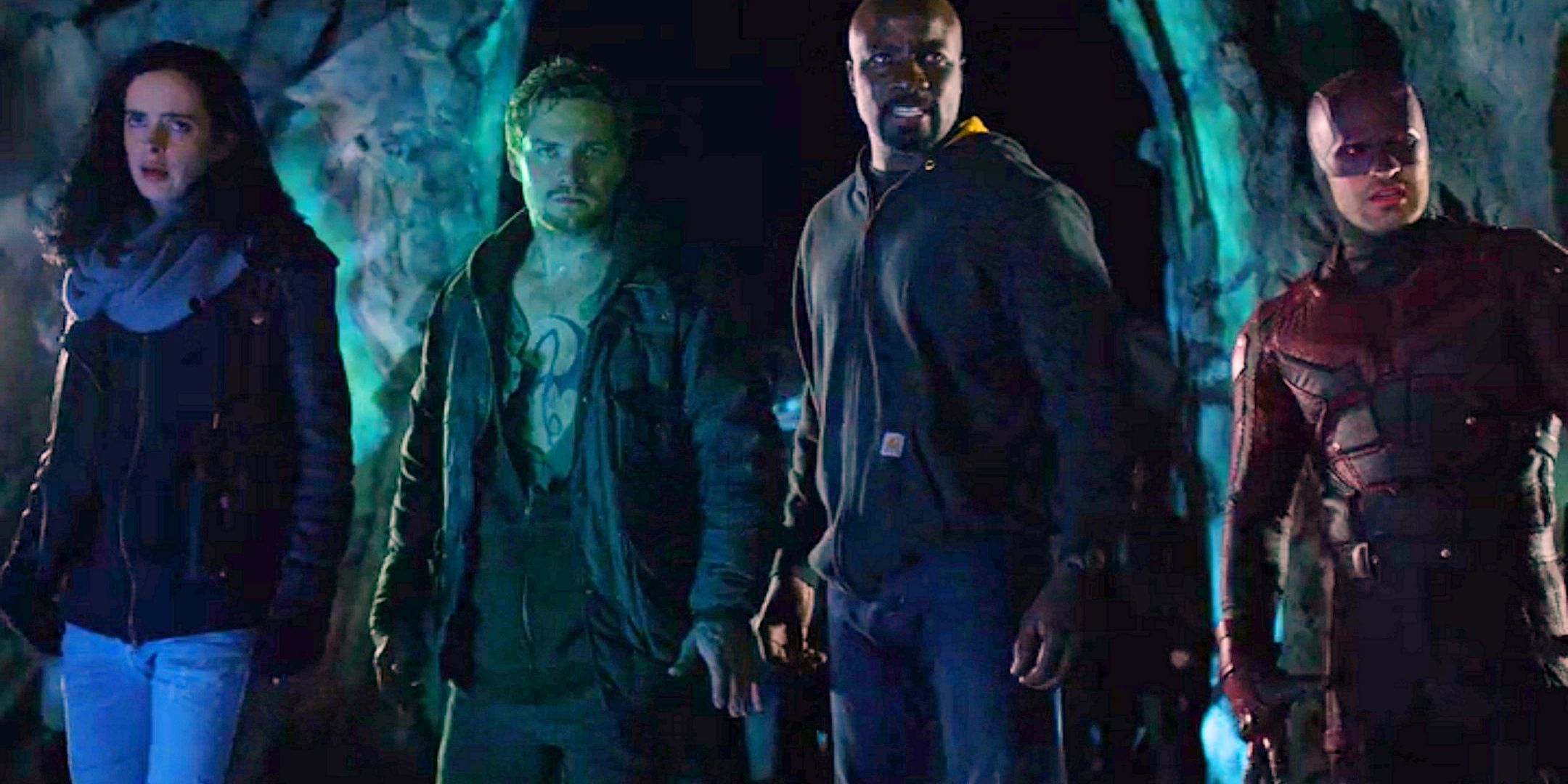 Jessica Jones, Danny Rand shirt ripped open to show Iron Fist dragon tattoo, Luke Cage, Daredevil in suit