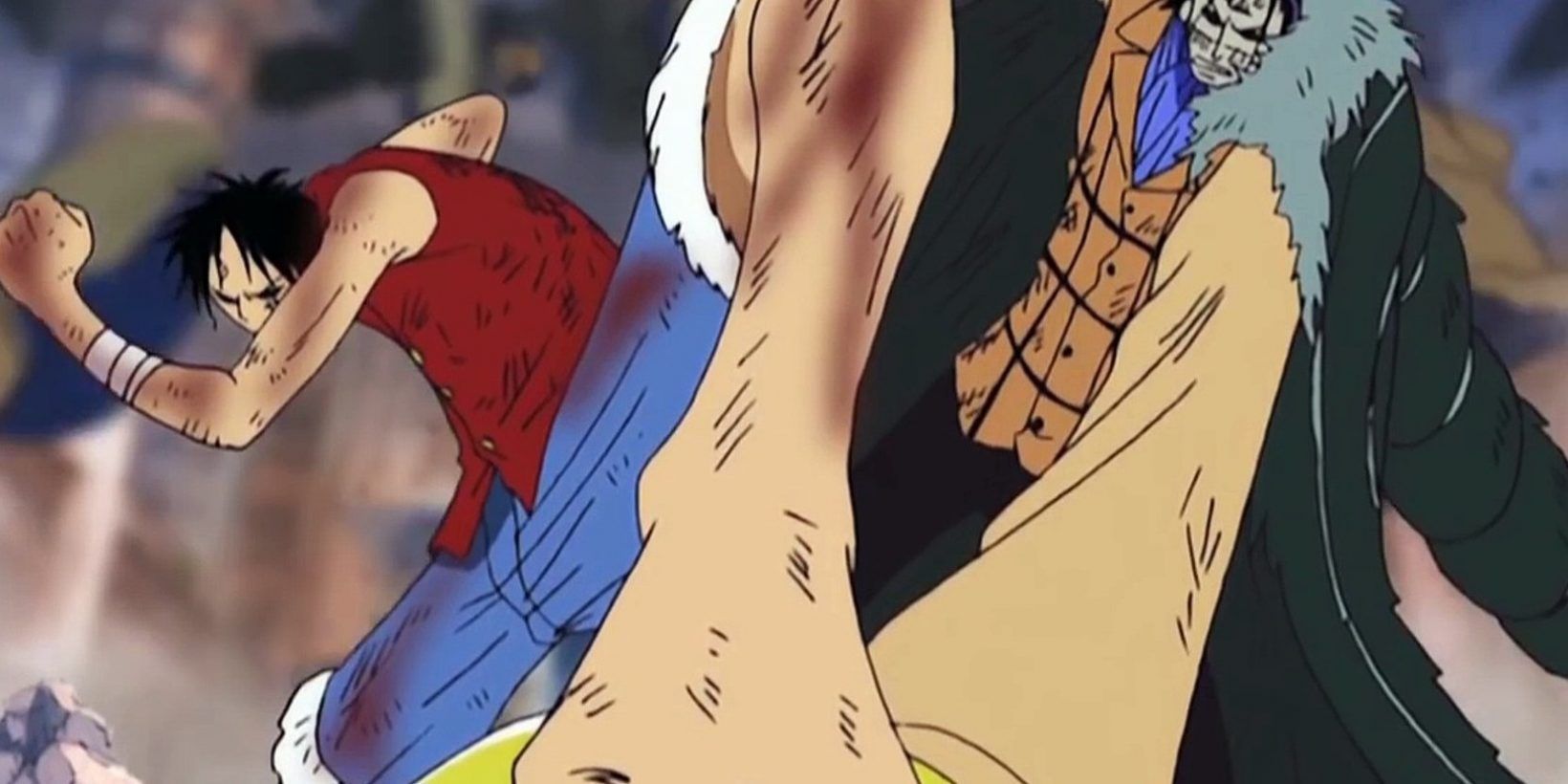 Luffy chutando crocodilo durante a batalha.