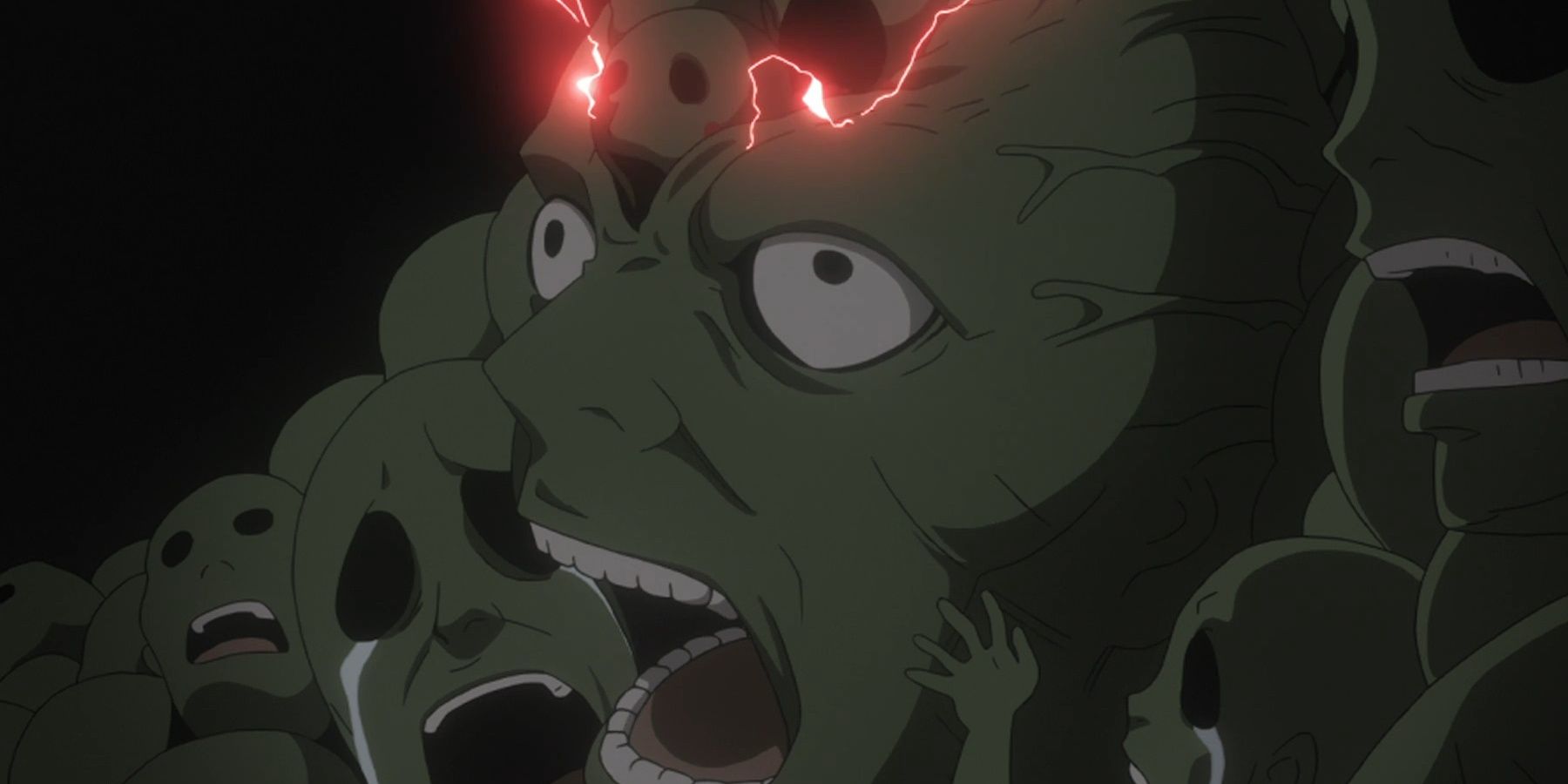 Faces appear on Envy's body with red lightning.