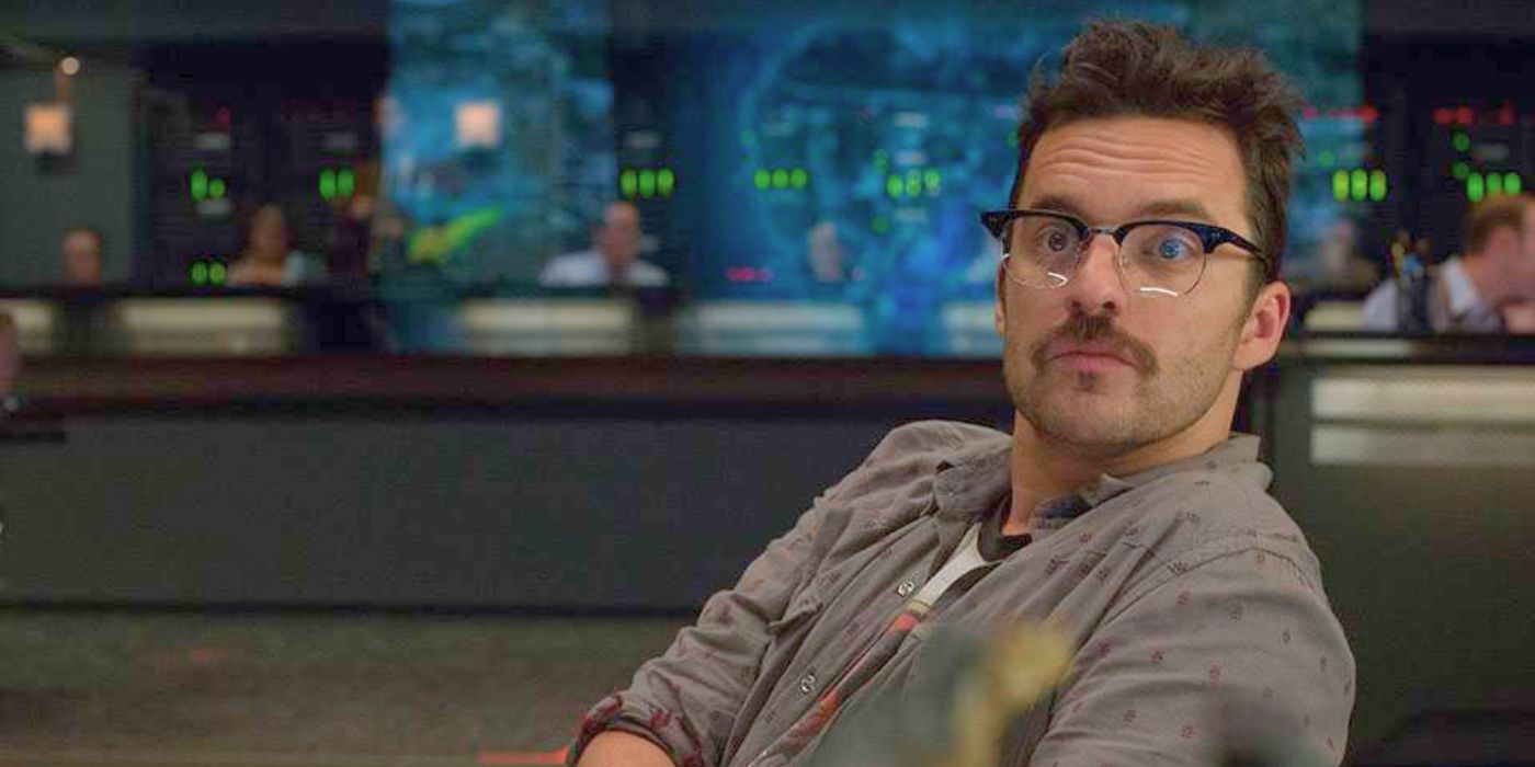 Lowery Cruthers (Jake Johnson) rocks his vintage Jurassic Park shirt and delivers commentary in 2015's Jurassic World.