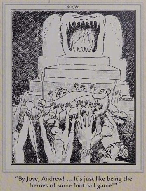 Two men are carried by a group