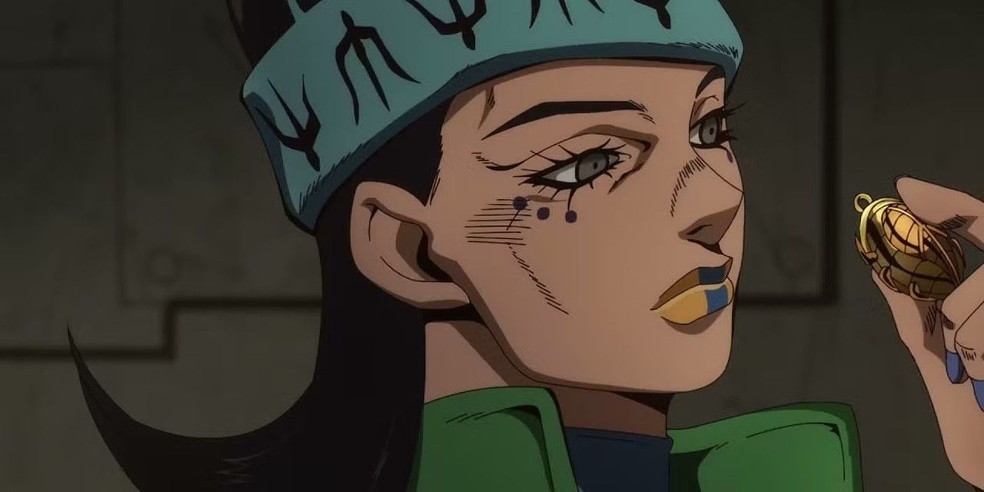 Gwess mira un insecto dorado en su mano.