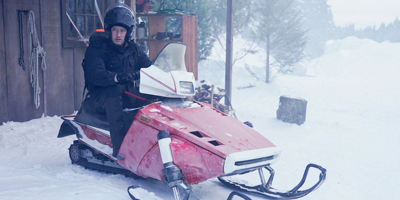 Justin Hartley as Colter Shaw on a snowmobile in Tracker 'The Mercy Seat'