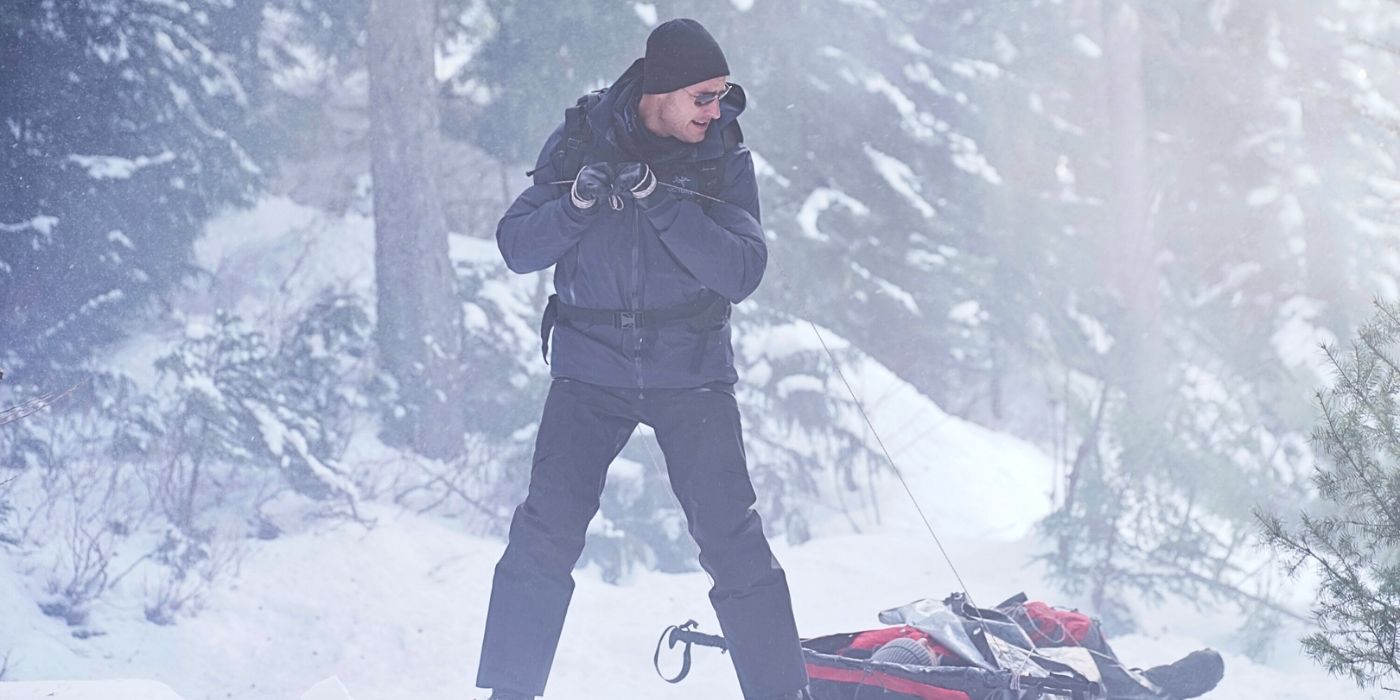 Justin Hartley as Colter Show pulling a sled in Tracker 'The Mercy Seat'