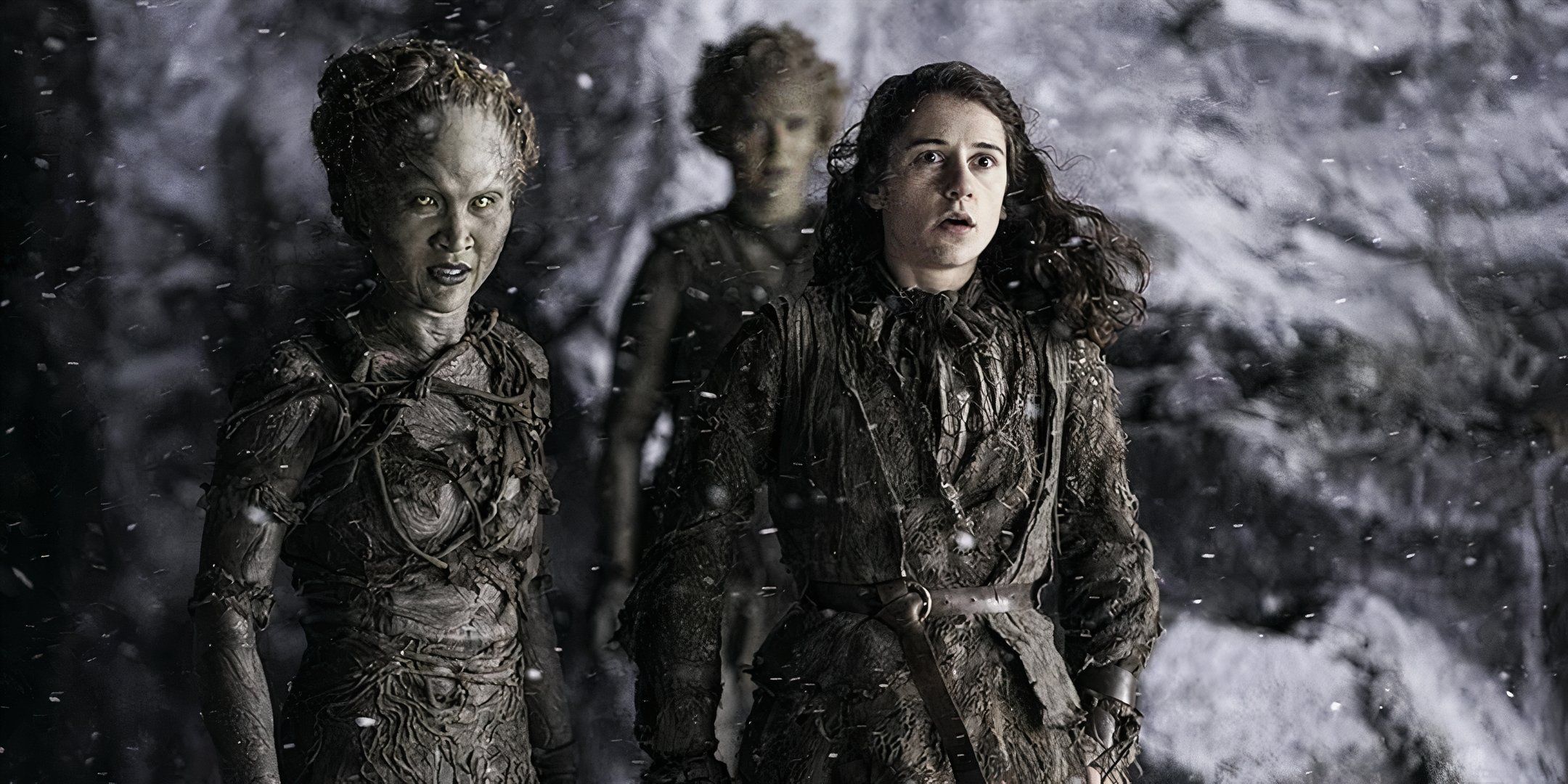 Meera Reed with the Children of the Forest at the heart tree in the wintery north