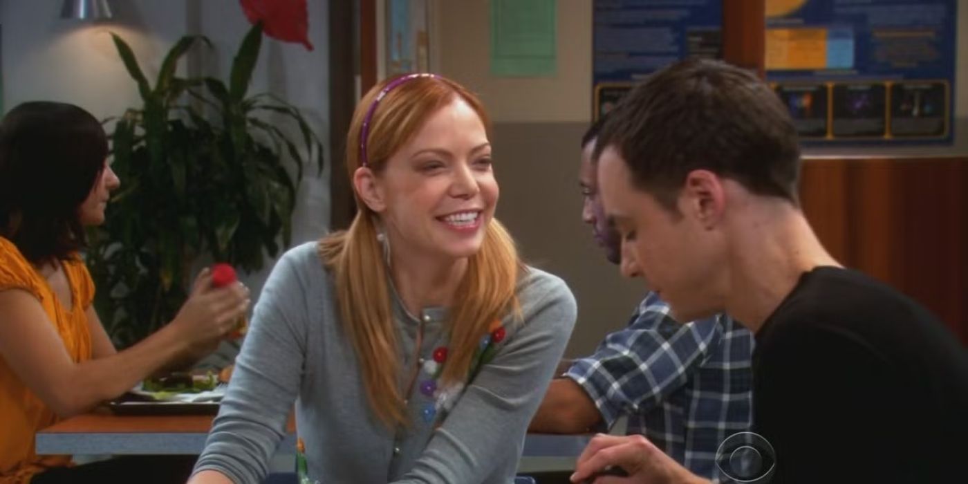Ramona smiles at Sheldon while he ignores her in The Big Bang Theory.