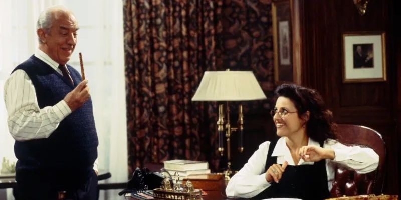 Ian Abercrombie as Mr. Pitt and Julia Louis-Dreyfus as Elaine Benes in Seinfeld