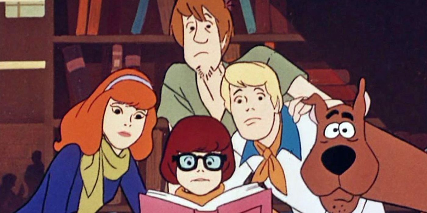 Velma, Daphne, Shaggy, Fred and Scooby stare with bewildered expressions in Scooby-Doo, Where Are You!