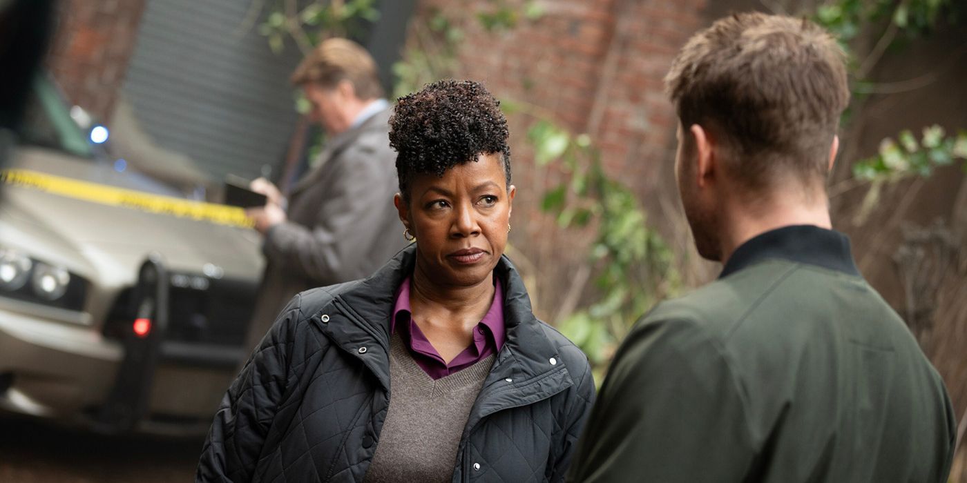 A woman looks at Colter in Tracker.