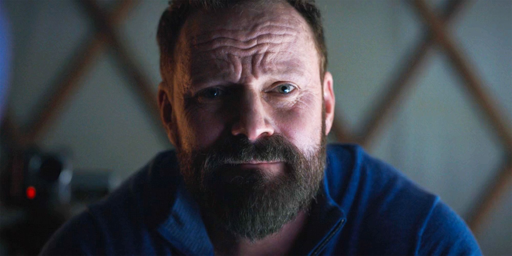 Seth staring at Colter in a close up in Tracker.