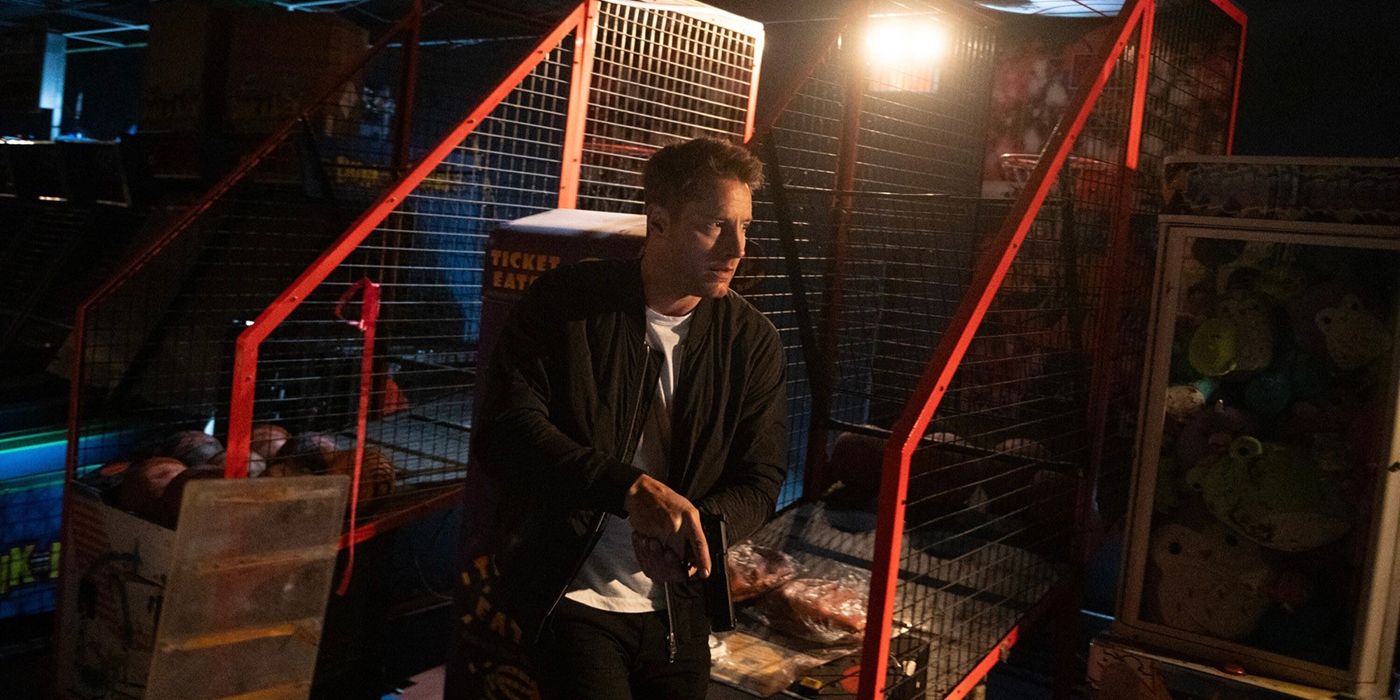 Colter crouching in an abandoned amusement park in Tracker.