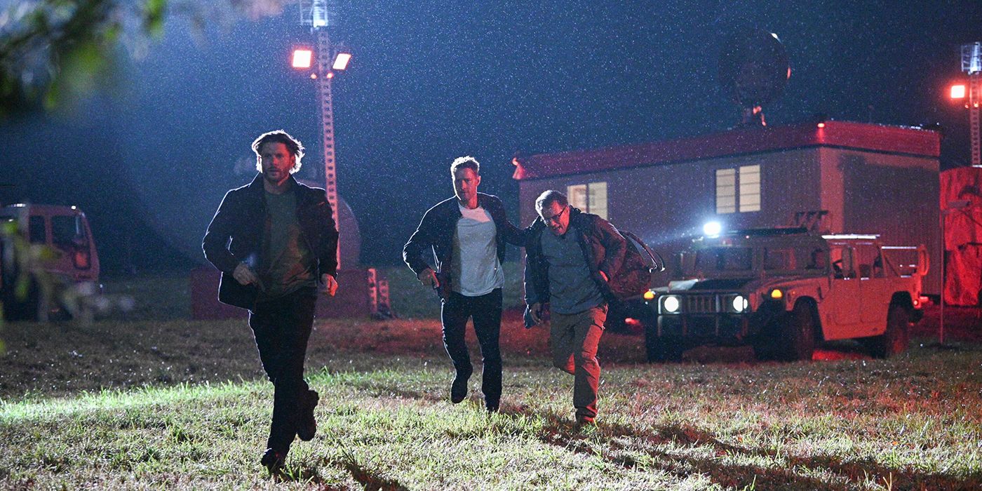 Russell and Colter running away from a government site with another man in Tracker.