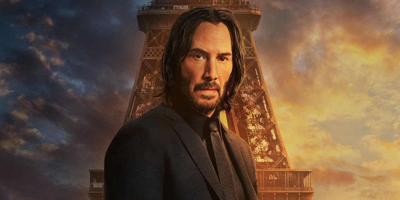 Keanu Reeves as John Wick with Eiffel Tower behind for John Wick: Chapter 4