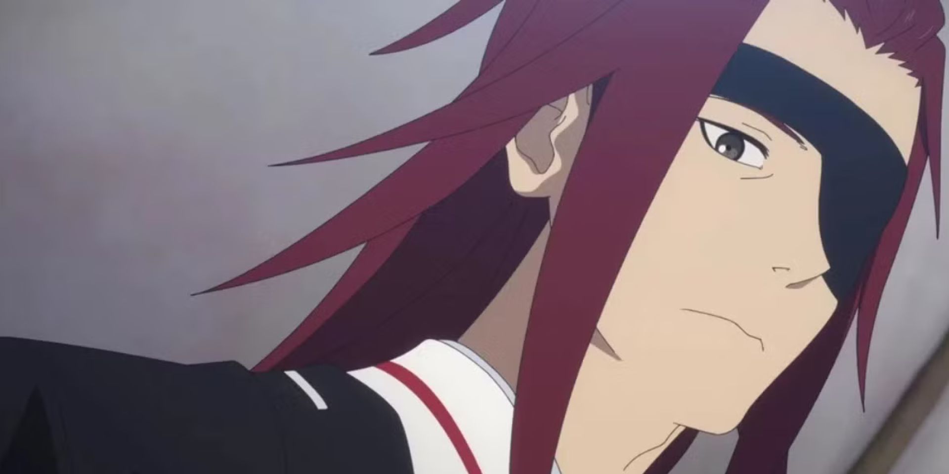 Un primer plano de Eizen en Hell's Paradise.