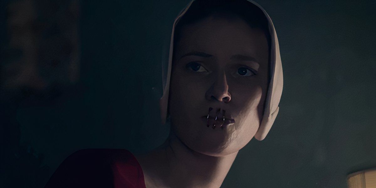 A handmaid with her mouth sewn shut