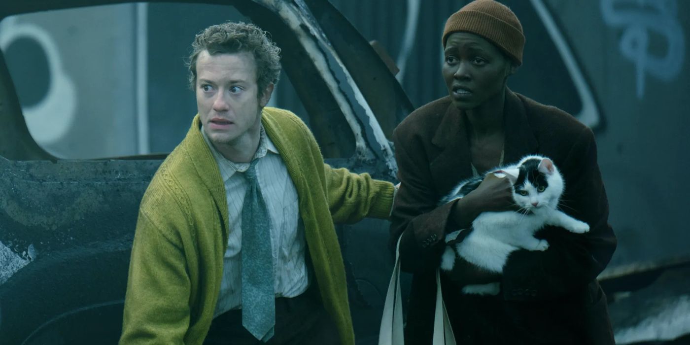 Lupita Nyong'o as Samira and Joseph Quinn as Eric with a cat from the movie A Quiet Place: Day One (2024)