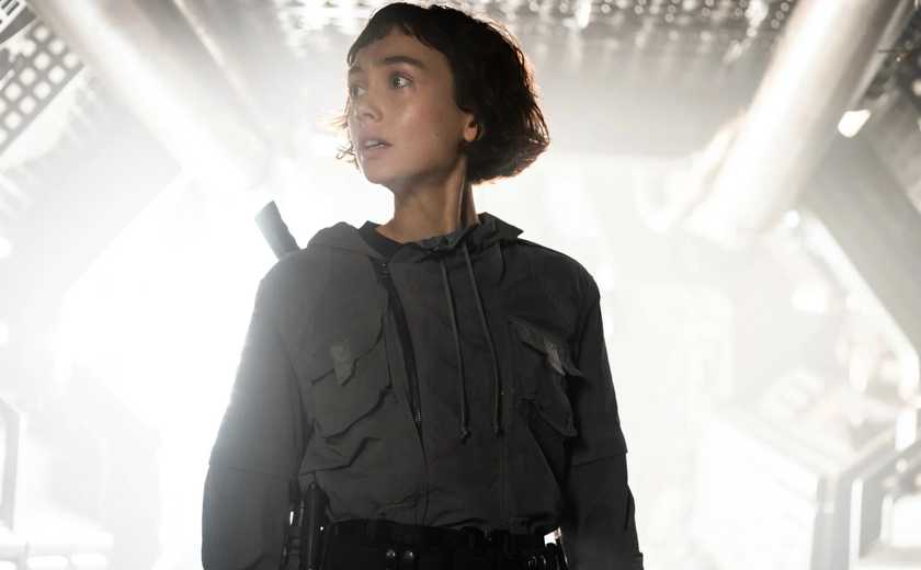 A character looks to the side in Alien: Earth