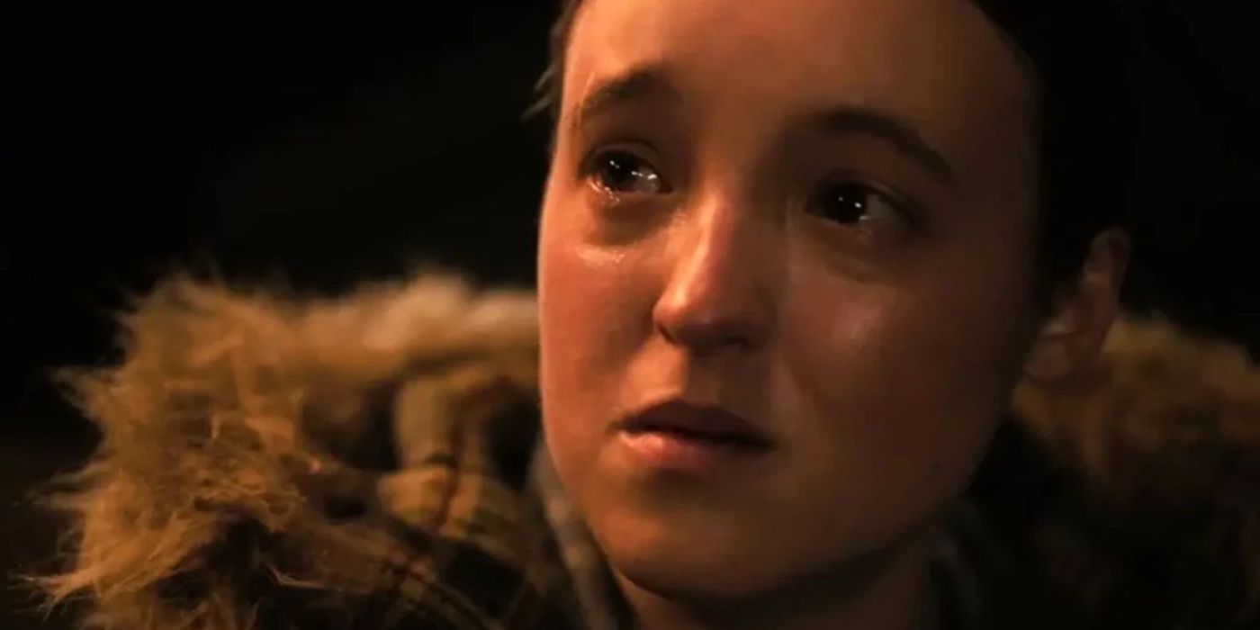 Ellie crying while looking at Joel during the porch flashback in The Last of Us episode "The Price"