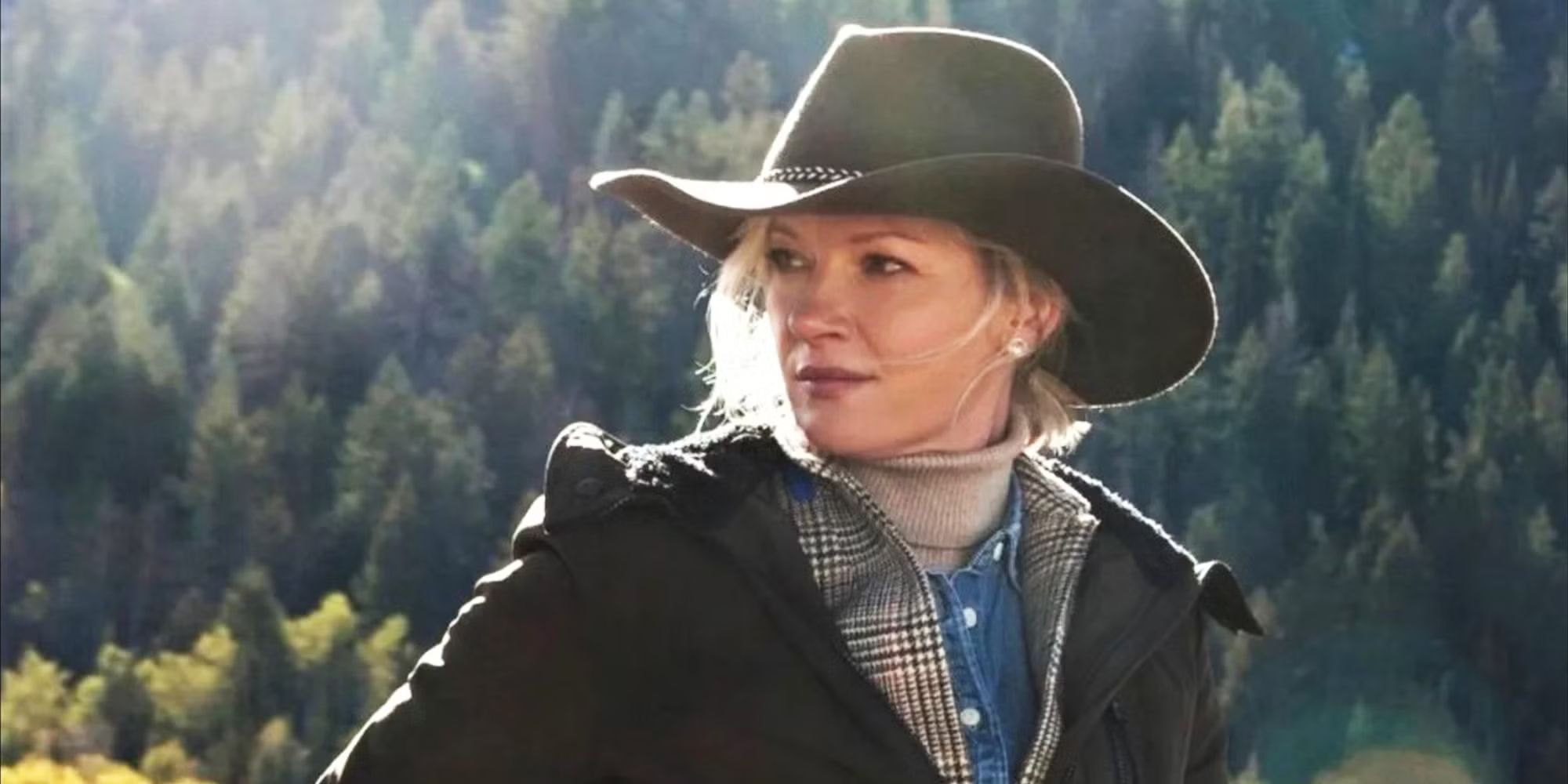 Evelyn Dutton against a backdrop of trees on Yellowstone