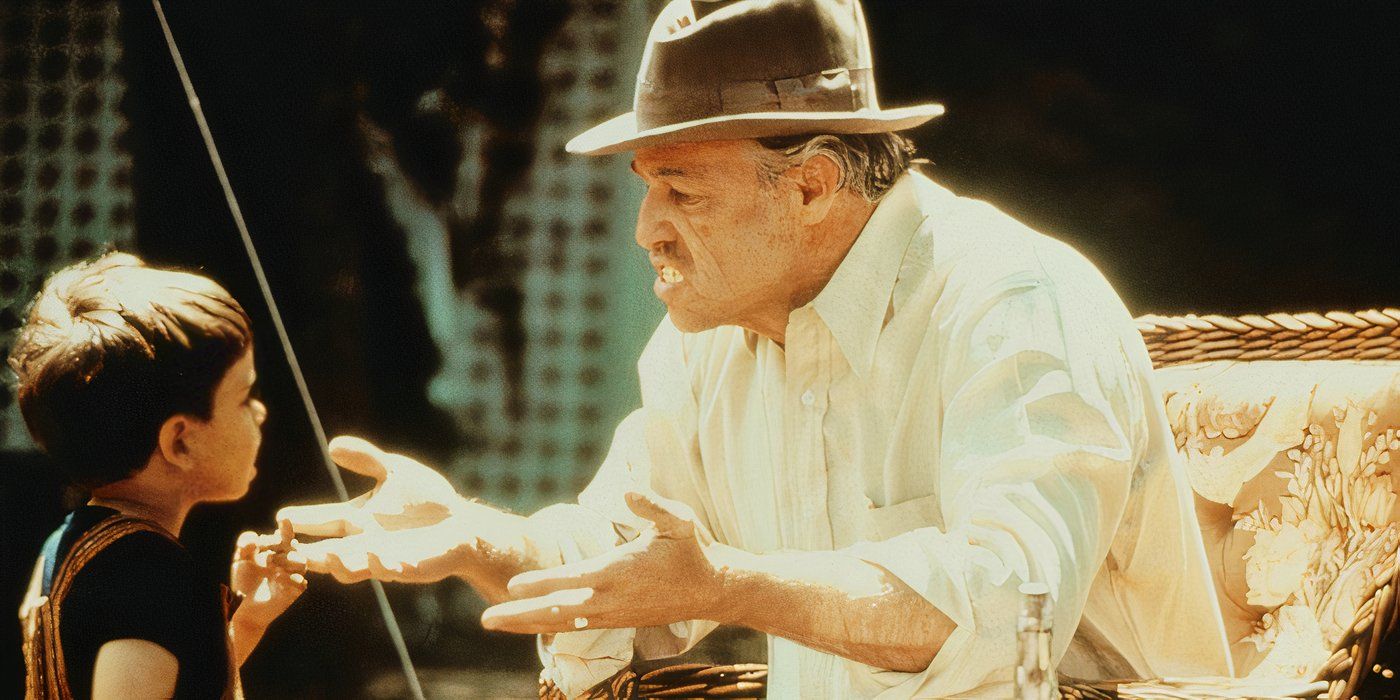 Vito Corleone juega con su nieto en el Padrino.