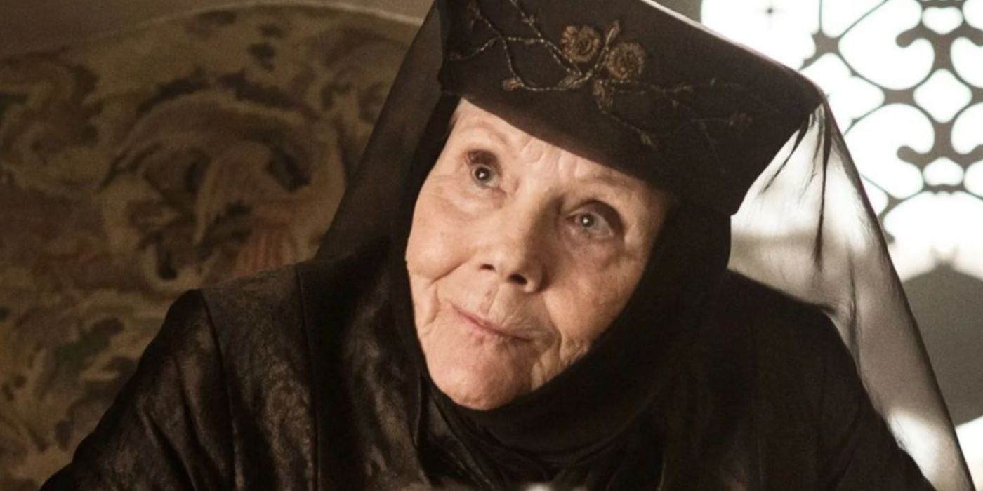 Olenna Tyrell is wearing a headdress and looking off-camera in Game of Thrones.