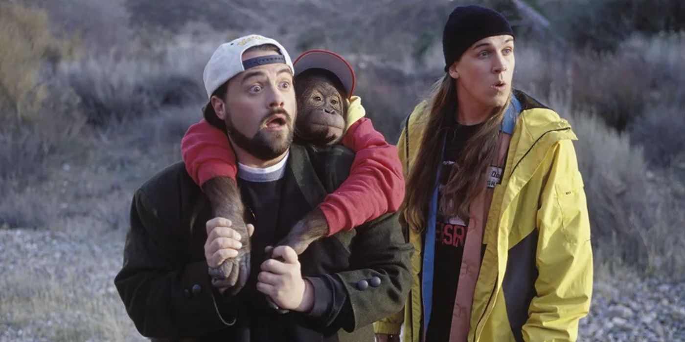 Jason Mewes as Jay and Kevin Smith as Silent Bob holding a monkey from the movie Jay and Silent Bob Strike Back (2001)