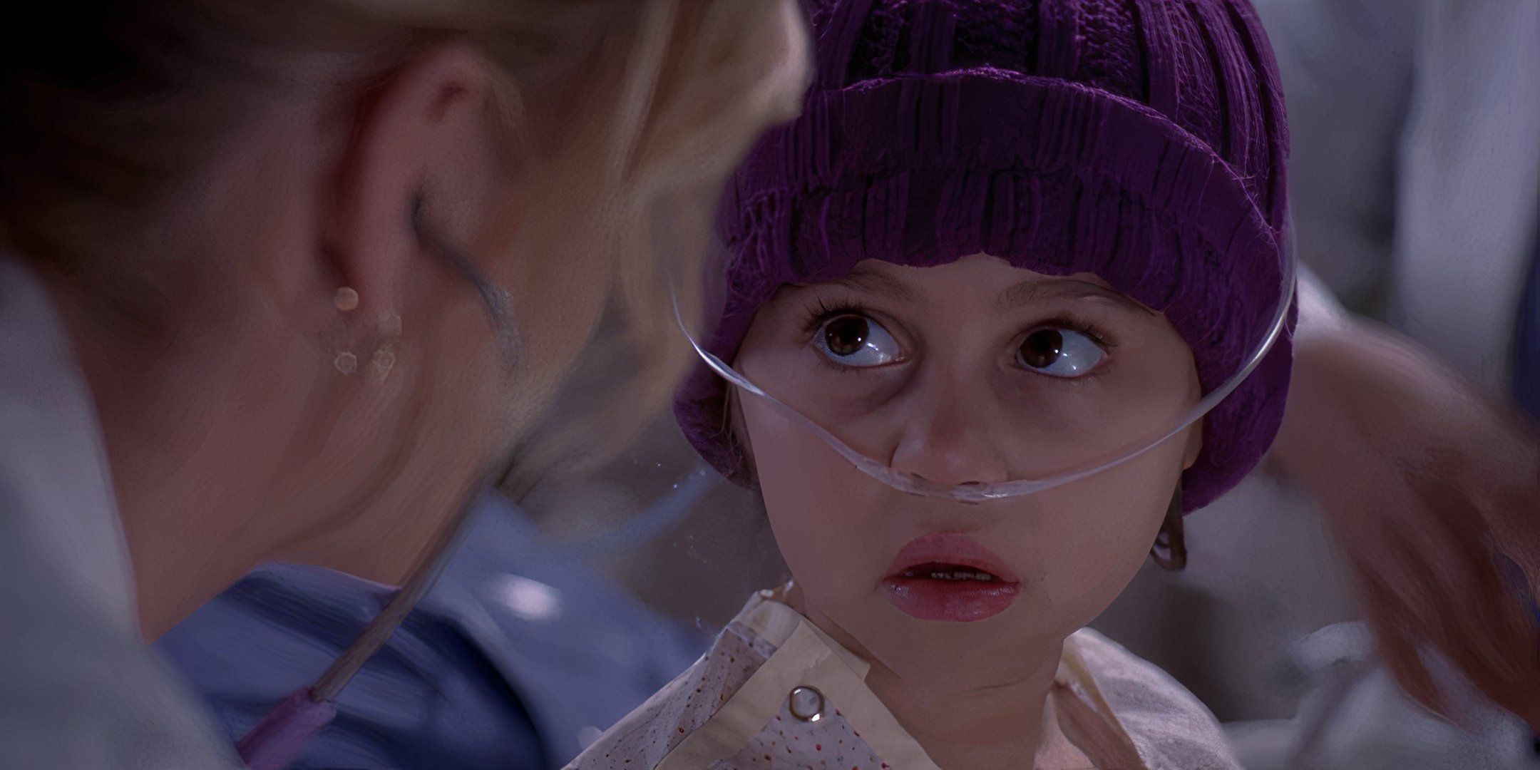 Jessica Smithson wearing her purple beanie looking up at Arizona in Grey's Anatomy