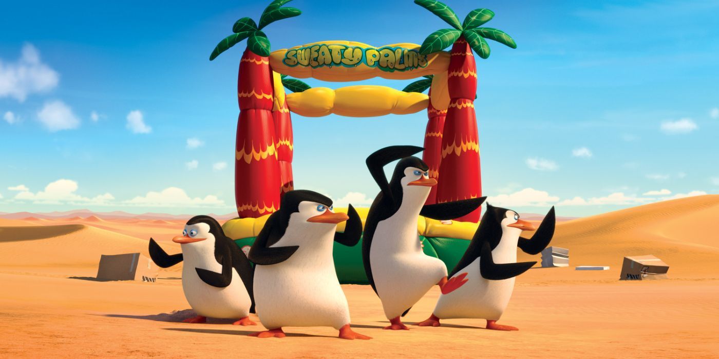 Skipper, Kowalski, Rico and Private in a desert next to a bouncy house from the movie Penguins of Madagascar (2014)