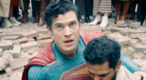 Superman carrying a civilian.