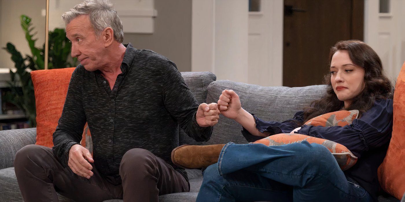 Tim Allen and Kat Dennings fist-bumping in Shifting Gears Season 1