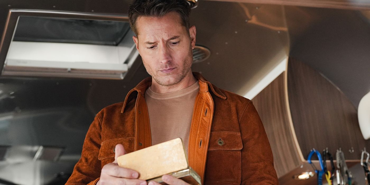 Colter looking at an item from his father's box of belongings in Tracker.