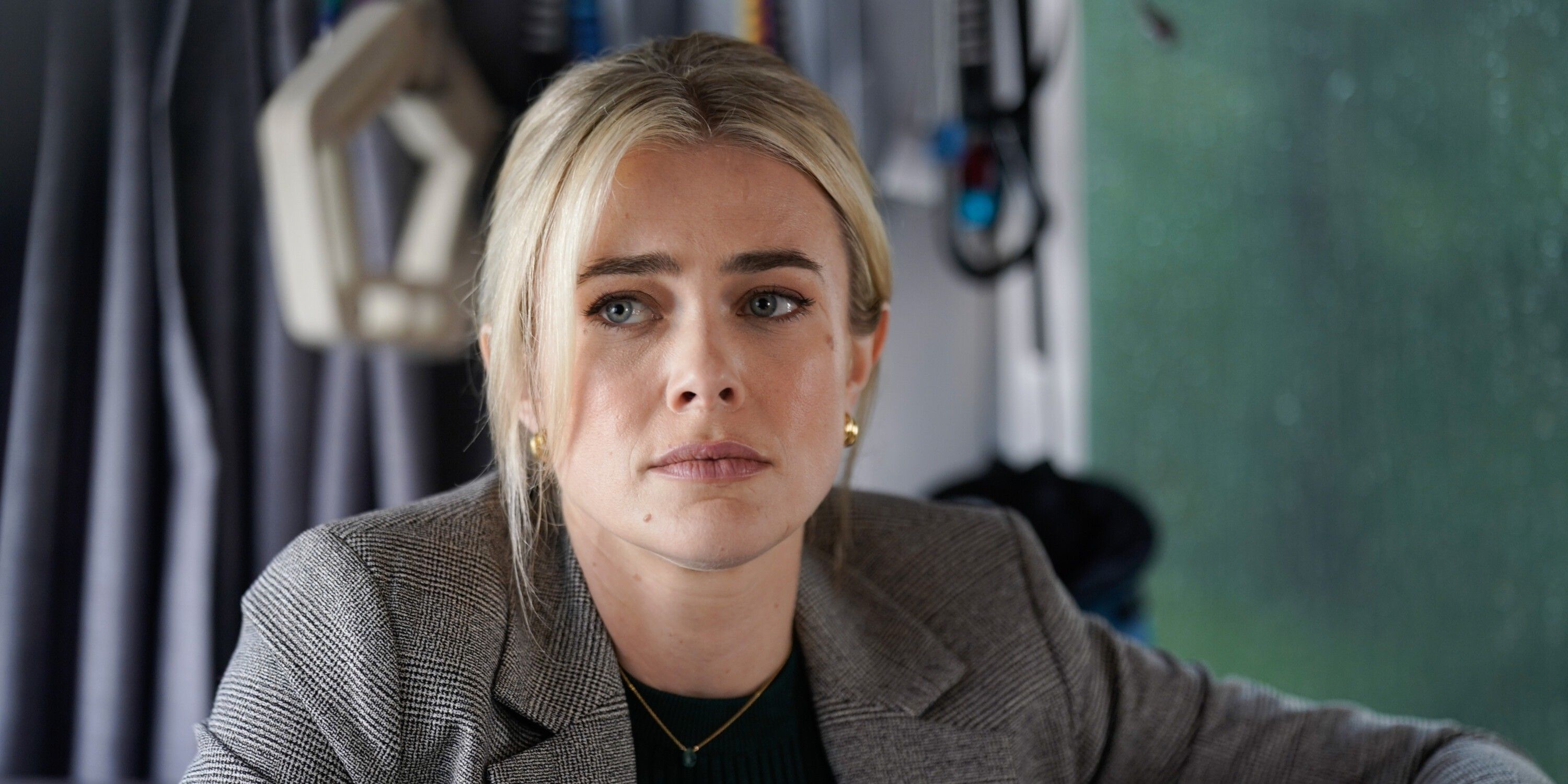 Dory Shaw, played by Melissa Roxburgh, seated and wearing a grey jacket on the TV show Tracker