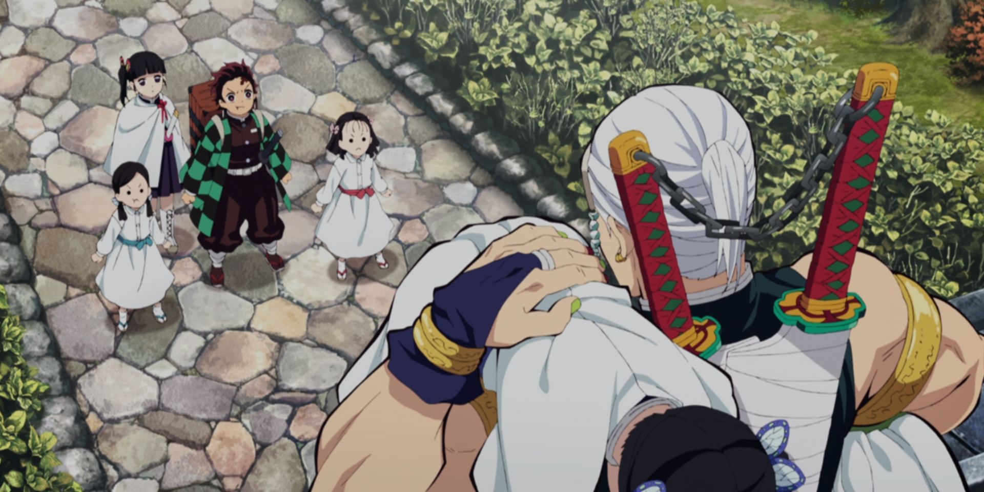 Tengen sostiene a Aoi mientras grita a Kanao y Tanjiro en Demon Slayer.