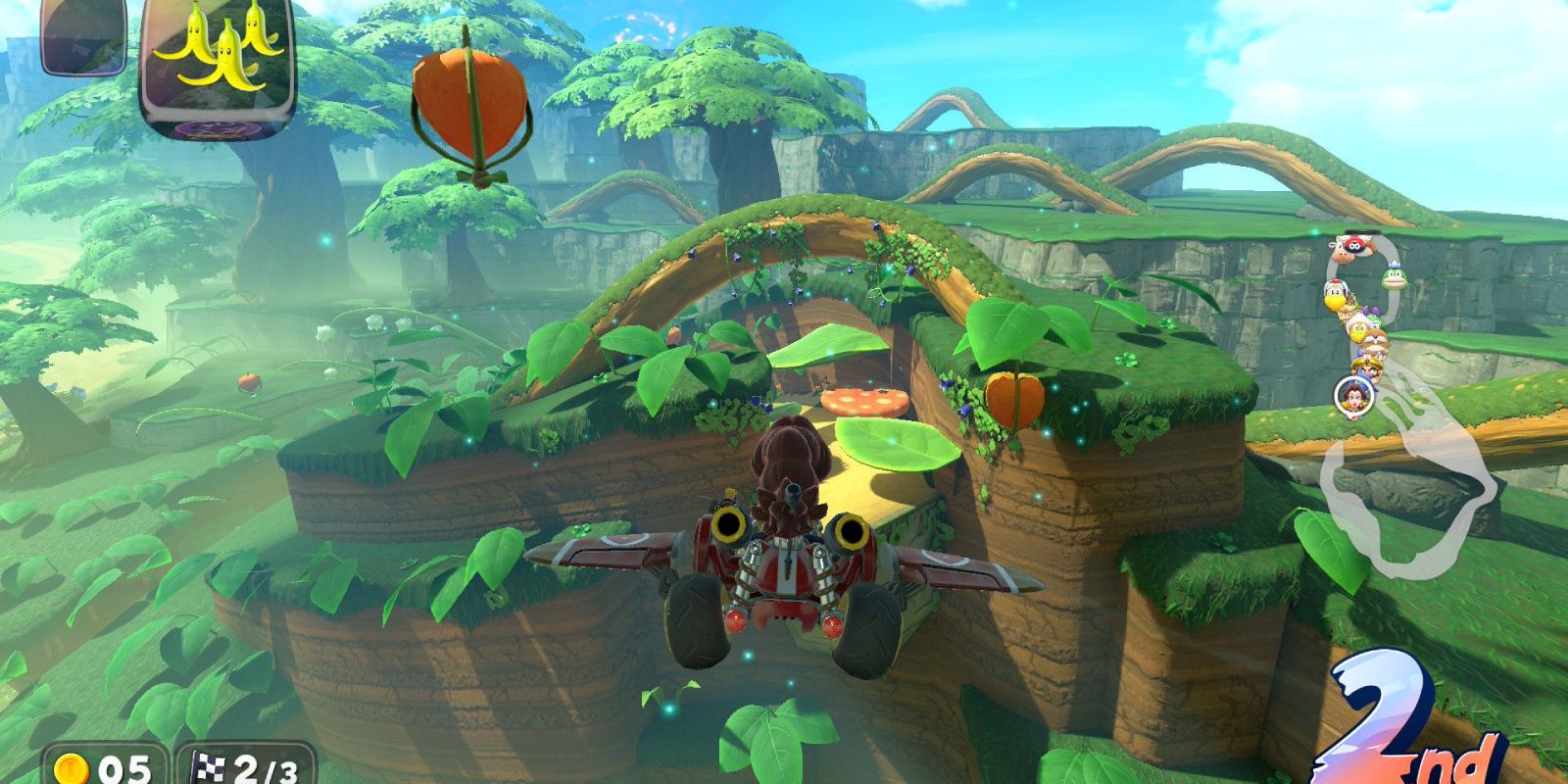 Pauline gliding toward a big leaf and a big mushroom below in Acorn Heights in Mario Kart World
