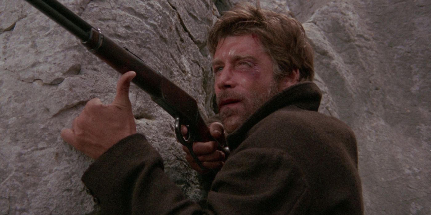 Alex Cord like Clay McCord giving a boost while holding his rifle in a minute to pray a second to die