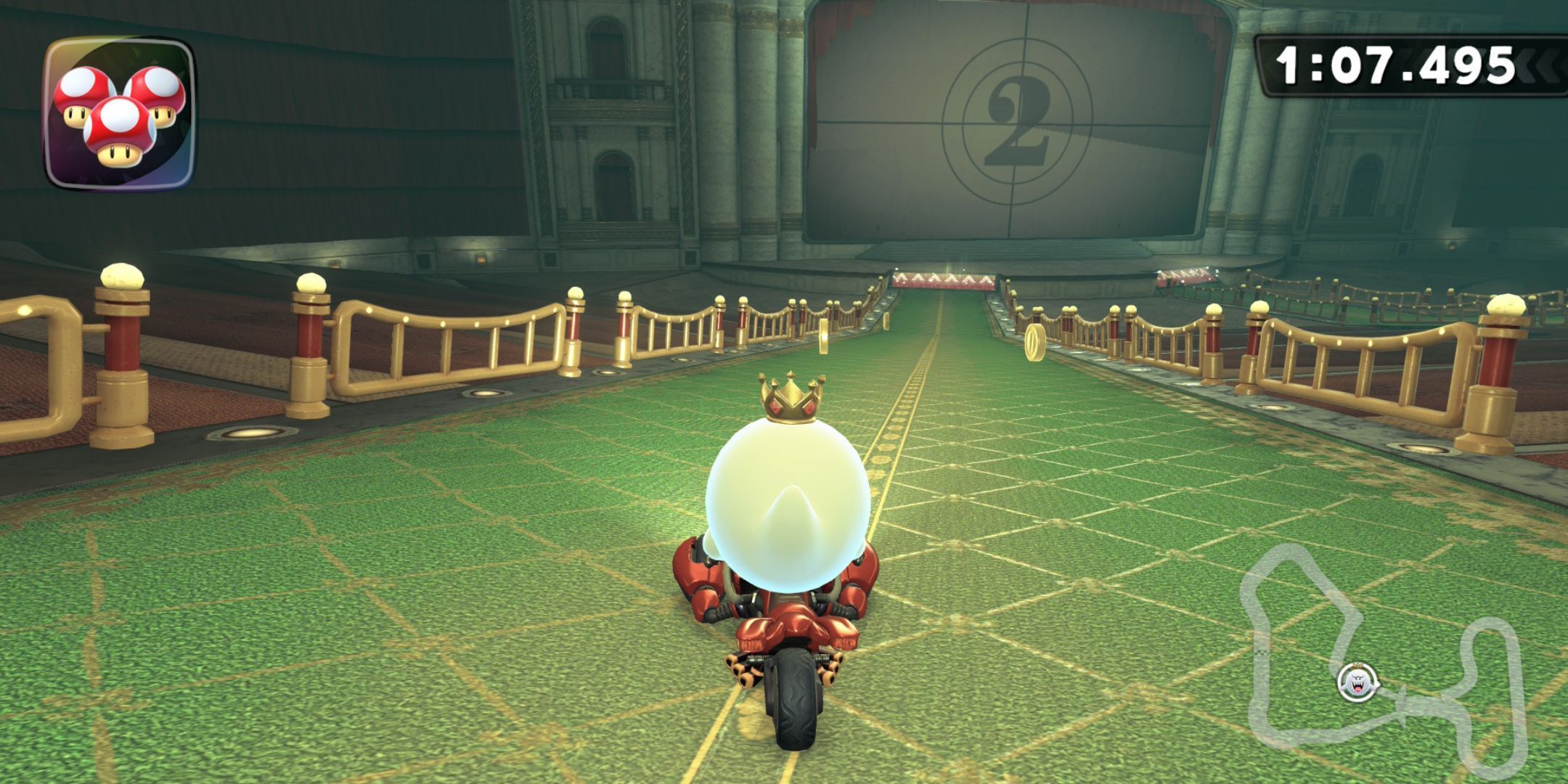 King Boo driving toward a movie screen in Boo Cinema in Mario Kart World