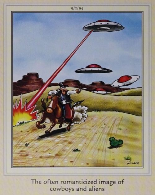 A cowboy fights aliens