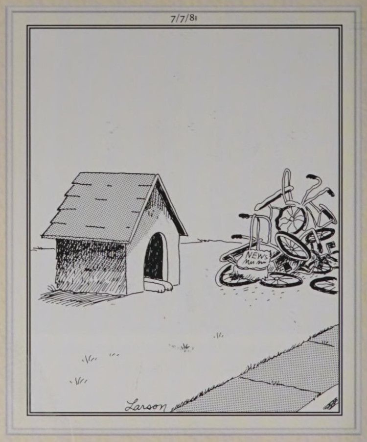 A dog house and pile of bicycles